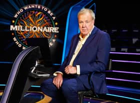 Jeremy Clarkson, sat in the host’s chair on set of Who Wants to be a Millionaire? (Credit: Stellify Media)