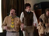 Jim Howick as Pat, Mat Baynton as Thomas Thorne, and Larry Rickard as Robin in Ghosts S4, all dancing awkwardly (Credit: BBC/Monumental/Robbie Gray)