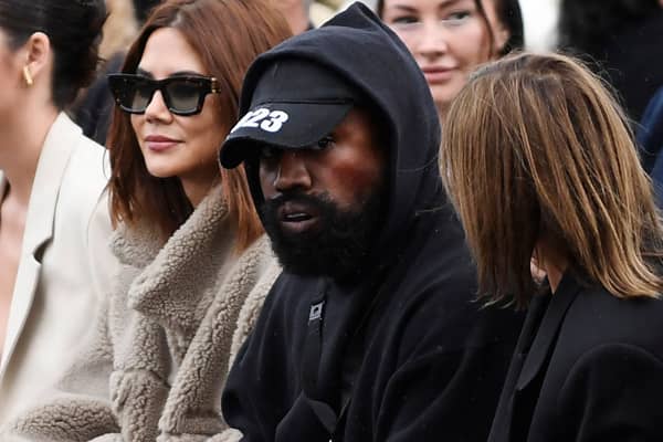 Kanye West attends the Givenchy Spring-Summer 2023 fashion show during the Paris Womenswear Fashion Week, in Paris, on 2 October 2022 (Photo: JULIEN DE ROSA/AFP via Getty Images)