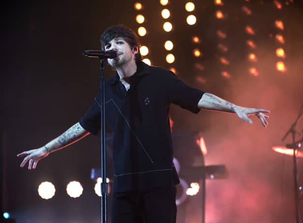 <p>One Direction singer Louis Tomlinson reschedules in-store signing after breaking arm</p>