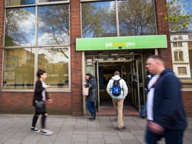 People walk near the Job Centre in Westminster.