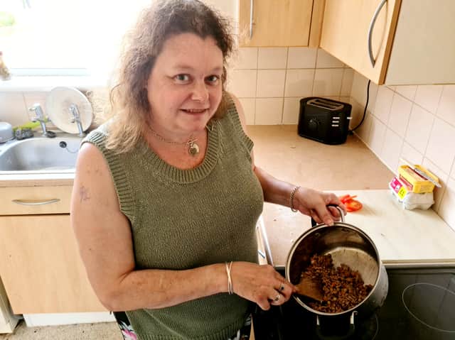 Alison Palmer with food she has made for her YouTube channel ‘cooking on benefits’.  A savvy mum reveals the shopping and cooking hacks that enable her to cook meals for her family for as little - as 75p. 
