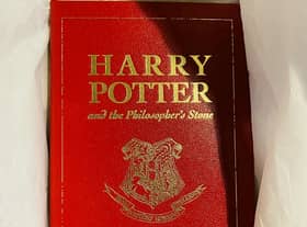 The leather-bound special 15th  anniversary edition of Harry Potter and the Philosophers Stone -  published exclusively for the competition in 2012.