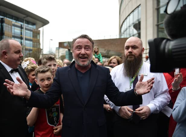 <p>Michael Flatley, star of Riverdance and Lord of the Dance is mobbed by fans as he makes an appearance during the opening day of the World Irish Dancing Championships at the Waterfront Hall on April 10, 2022 in Belfast</p>