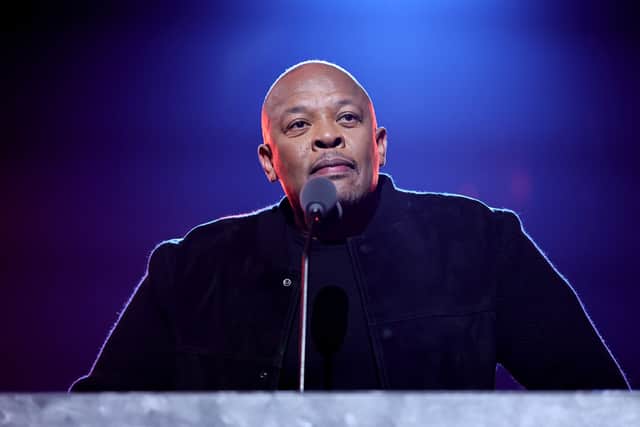 Dr. Dre introduces Inductee Eminem onstage during the 37th Annual Rock & Roll Hall of Fame Induction Ceremony at Microsoft Theater on November 05, 2022
