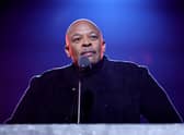 Dr. Dre introduces Inductee Eminem onstage during the 37th Annual Rock & Roll Hall of Fame Induction Ceremony at Microsoft Theater on November 05, 2022