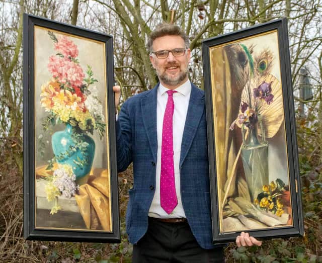 Charles Hanson, owner of Hansons Auctioners, with Queen Victoria’s paintings.