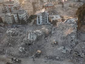 An aerial view of work machines and diggers at the site of collapsed buildings on February 16, 2023 in Hatay, Turkey