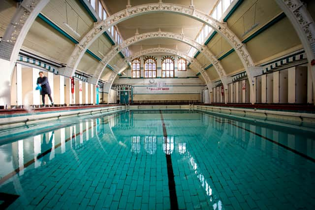 Stephanie Jones Duty Manager cleaning The Moseley Road Baths after renovation