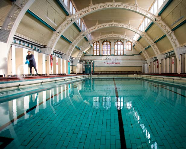 Stephanie Jones Duty Manager cleaning The Moseley Road Baths after renovation