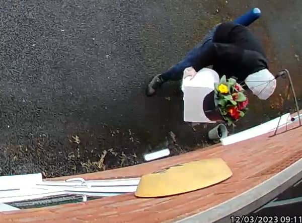 Owner Kim Hughes was left “mortified” when she watched back the footage and saw the hooded man walking off with the box filled with letters to dead relatives. 