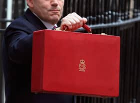 The red briefcase being held by chancellor Gordon Brown in 2007 (Photo: Getty) 