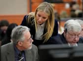 Gwyneth Paltrow appeared to whisper to Terry Sanderson after the verdict of her ski crash legal battle was revealed - Credit: Getty Images