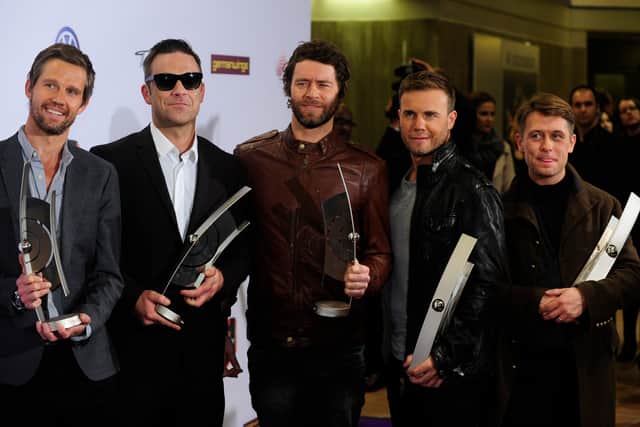 Take That fans have been left excited after a series of posts have hinted that the group could reunite