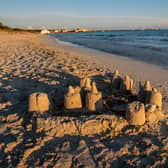 Strict beach laws in Benidorm could see visitors fined £130 for building a sandcastle (Photo: Adobe)