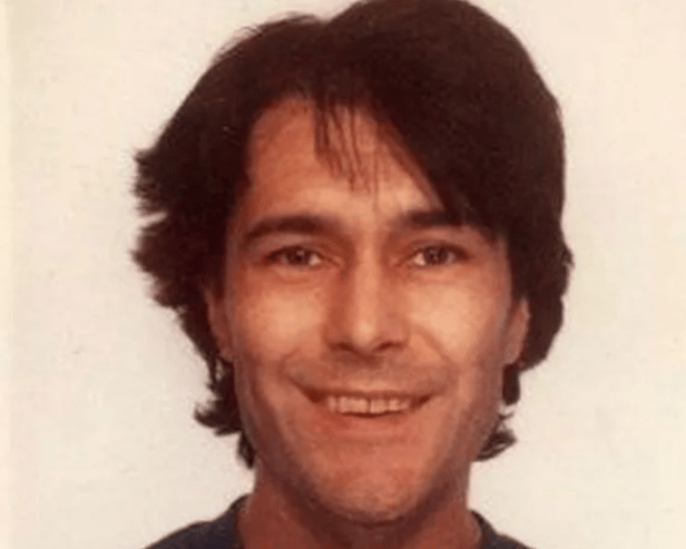 Human remains found in Welsh woodland have been confirmed to be that of Russell Scozzi, a computer expert who was last seen 20 years ago. 