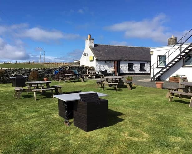 The gastropub is being sold for £399,000 on an island famed for its white sand beaches. It has a gigantic beer garden and a rustic bar and was refurbished during the pandemic.  (Courtesy Alice Bagley / SWNS)