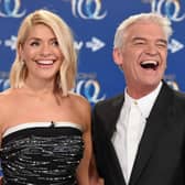 Holly Willoughby (left) and Phillip Schofield (right) put up a united front in Monday's episode of This Morning after rumours of a bitter feud between the hosting duo - Credit: Getty