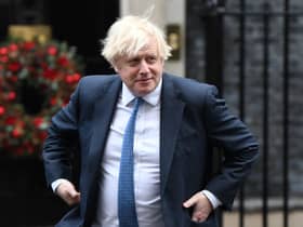 Boris Johnson has previously promised that Christmas 2021 would be ‘considerably better’ than last year's (image: AFP/Getty Images)