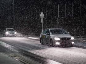 Motorists drive through a heavy snow shower as it passes over Saltburn By The Sea as Storm Arwen sweeps across parts of the country on November 26, 2021 (Photo: Getty)