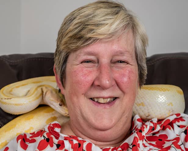 A woman who adopted a python following the death of her husband said she ‘felt an instant connection’ and the reptile brings her ‘so much joy’ 