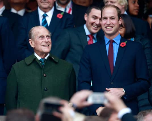 Prince Phillip and Prince William enjoy the build up to the 2015 Rugby World Cup Final match between New Zealand and Australia at Twickenham Stadium (Photo by Phil Walter/Getty Images)