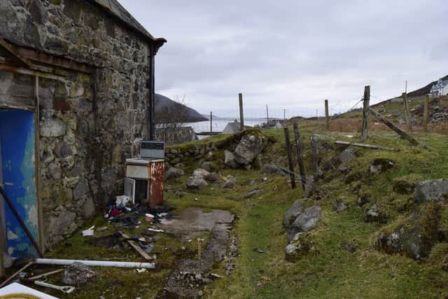 The doer-upper is set in an idyllic location