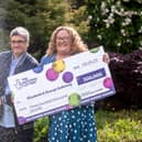 National Lottery winners Liz and George Galloway celebrate after winning Â£300,000 on the National Lottery Bingo Bonus Scratch card in Glasgow. (Photo: Anthony Devlin)