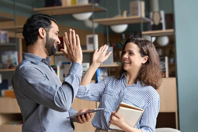 Happy employees in a work environment 