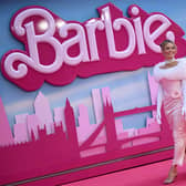Australian actress Margot Robbie poses on the pink carpet upon arrival for the European premiere of “Barbie” in central London.