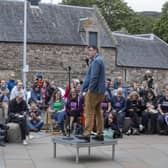 Graham Linehan performs outside Scottish Parliament days after Edinburgh Fringe cancelled Father Ted creator