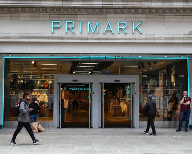 A pedestrian walks past a Primark store on Oxford Street, London.