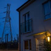 Insulators on an electricity sub station are seen near homes in Manchester.