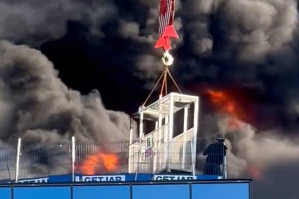 A workman was lifted to safety after a huge fire at a high-rise building in Reading. (Credit: Chris Lauder/X/PA Wire