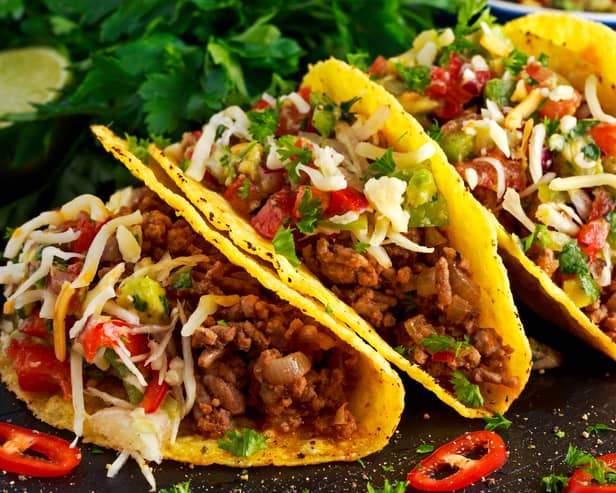 Mexican food - delicious taco shells with ground beef and home made salsa. Image: Grinchh/stock.adobe