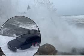 Waves soak car as Storm Kathleen batters British coast.