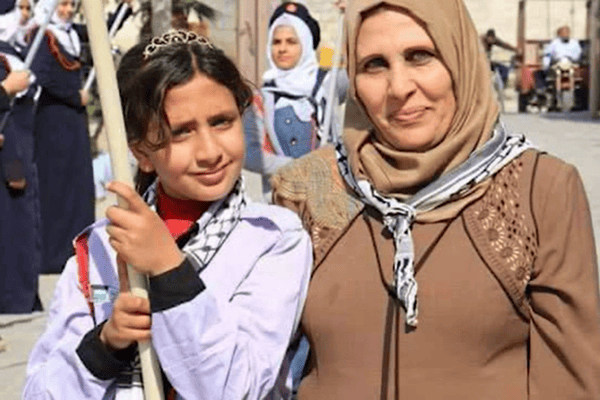 Mahmoud's mother and one of his sisters