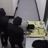 CCTV capturing the masked gang inside the The Pirelli Stadium, home to Burton Albion Football Club, April 14, 2024.  