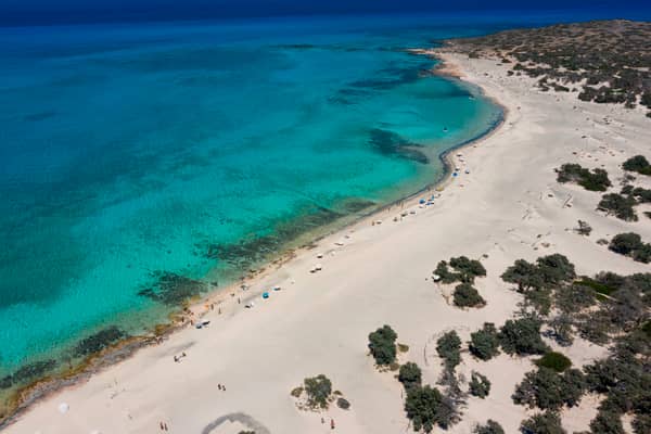 UK holidaymakers could face a £850 fine over a little known rule on Lalaria beach in Skiathos - featured in the film Mamma Mia! (Photo: AFP via Getty Images)