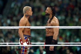 Roman Reigns and Cody Rhodes look on during Night Two at Lincoln Financial Field on April 07, 2024 in Philadelphia, Pennsylvania.  (Photo by Tim Nwachukwu/Getty Images)