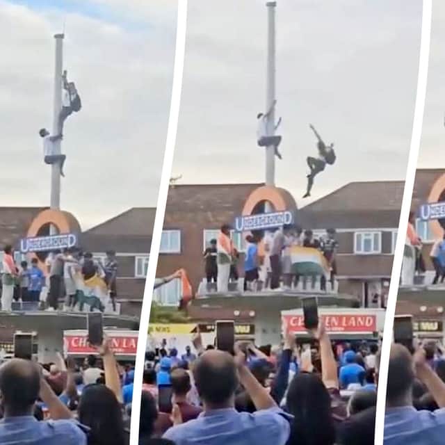 This is the heart-stopping moment an Indian fan plunged 30ft after trying to tie a flag around a pole during wild T20 World Cup celebrations. 