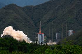 A rocket successfully lifts off from a space base in Xichang, in China's southwestern Sichuan province on June 22, 2024. (Photo by ADEK BERRY/AFP via Getty Images)