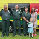 Lola Brisbane and her bravery award from EMAS. 