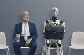 Man and AI robot waiting for a job interview