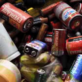 A pile of dead batteries. Photo: Manjunath Kiran/AFP via Getty Images