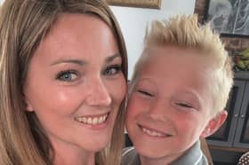 Jay Whitfield, 37, with her seven-year-old son.
