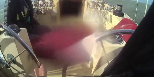 Marine Police rescue yachtsman from storm.
