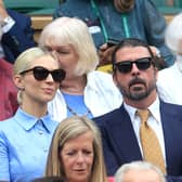 Dave Grohl, and his wife Jordyn Grohl are seen in the Royal Box at Wimbledon earlier this year