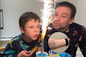 Non-verbal autistic boy communicates using dad's alphabet tattoo