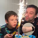 Non-verbal autistic boy communicates using dad's alphabet tattoo